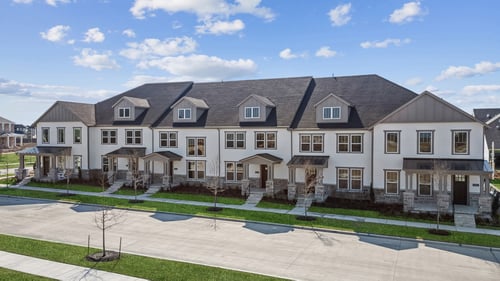 Exterior of the CB JENI Homes model home at Village on Main Street in Frisco, TX.