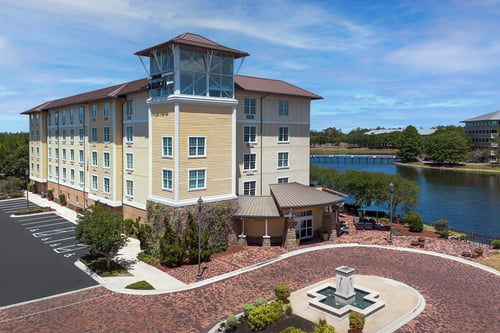 Brick-paved entrance at Hotel Indigo Jacksonville Deerwood Park.