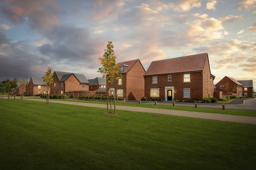 DUSK STREET SCENE OF NEW HOMES