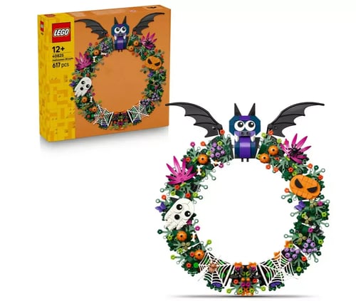 Halloween wreath made of lego featuring a bat, a ghost, a pumpkin and spider webs