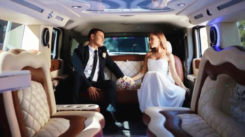 married couple inside a limo