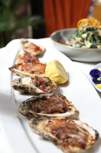 Smoked Pork Chargrilled Oysters served at Smoked on Main Street in Columbia, South Carolina