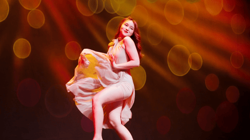 Dancer performing routine on stage
