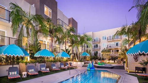 Apartment complex with pool at Vida North Park Apartments, San Diego, CA
