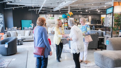 Sunset Hills Slumberland Furniture people shaking hands