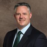 A headshot image of Kyle Meek.