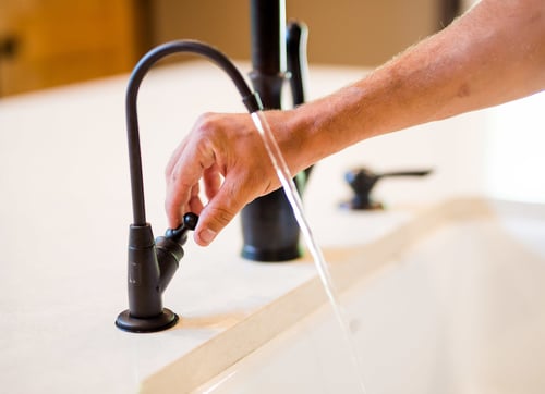 Kitchen faucet with running water by All Ways Plumbing in Plymouth, MN.