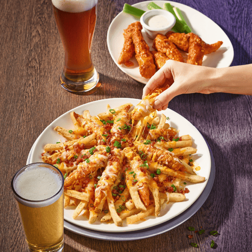A Zingers Mountain Melt® and a plate of Zingers® paired with ice cold beer