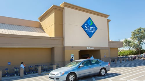 Silver car in front of Sam's Club entrance