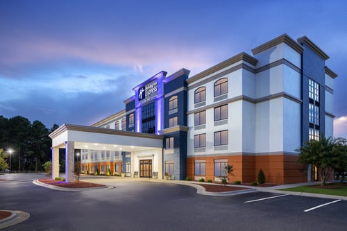 Exterior of hotel at dusk
