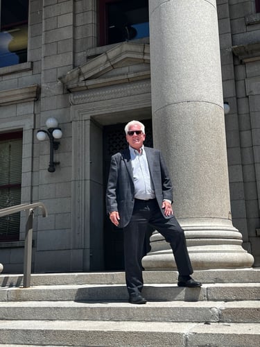 Pit Martin, Attorney, on steps of courthouse.