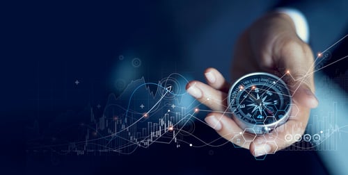 hand holding stopwatch with dark led screen in background