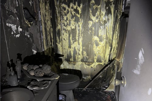 Extensive fire and smoke damage in a bathroom in Myrtle Beach after a fire damaged the home.