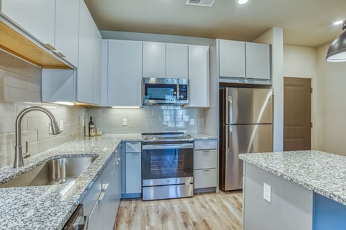Kitchen with Stainless steel appliances The Beck at Hidden River Apartments Tampa FL 33637