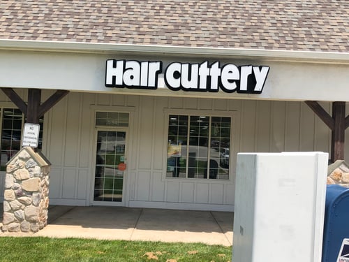 The front entrance of Hair Cuttery at Maplelawn Village Center.