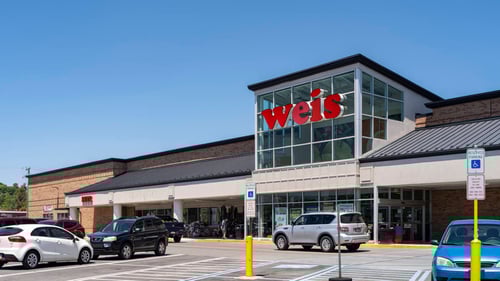 Cars parked through front of Weis at Park Hills Plaza Shopping Center