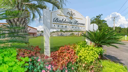 Entrance sign for Baldwin Farms Apartments