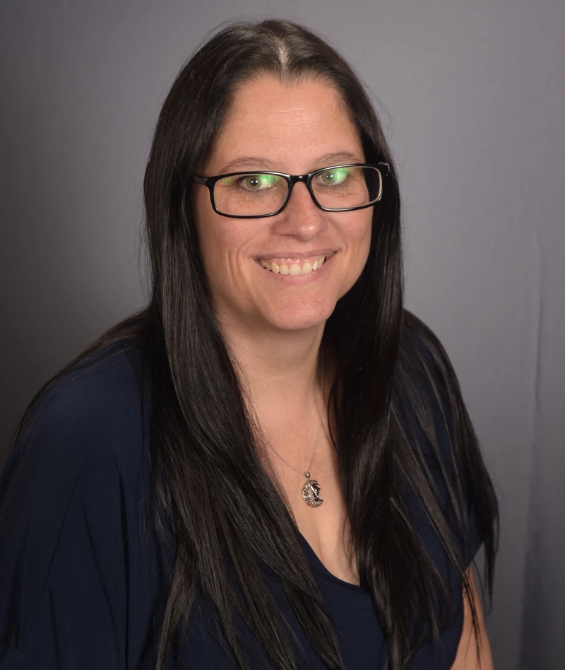 Headshot of School Director Amber Testa