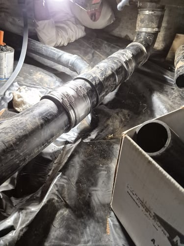replacing a main sewer lateral under a Southwest Portland home