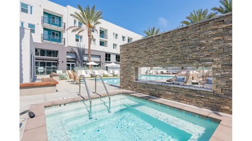 Apartment complex with pool at Ocean Creek, Oceanside, CA