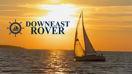 The Downeast Rover sailing into an Outer Banks sunset.
