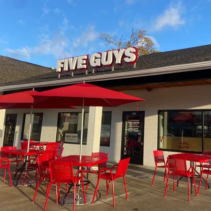 Exterior photograph of the Five Guys restaurant at 978 Main Street in Weymouth Massachusetts.