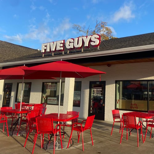 Exterior photograph of the Five Guys restaurant at 978 Main Street in Weymouth Massachusetts.