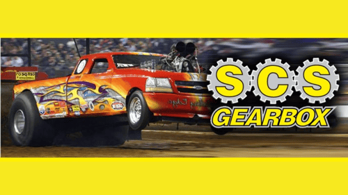 truck during a tractor pull with logo next to it