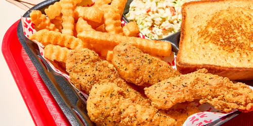 Zaxbys lemon pepper fingers with fries, coleslaw, and texas toast.