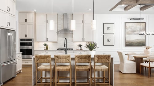 Well-appointed kitchens with large center islands and abundant cabinetry