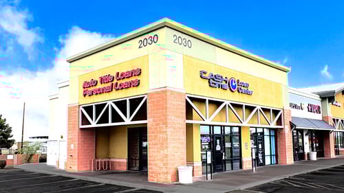 Cash Time South Mountain Pavilion storefront at Baseline and 19th Avenue near Lowes offering title loan buyouts, registration loans, and personal loans with same day cash and 15 approvals
