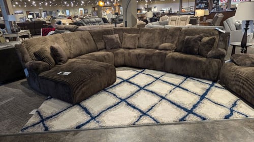 Amery Slumberland Furniture large sectional and rug