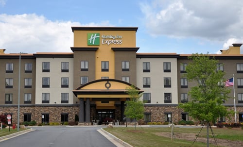 A large entryway and flat parking area welcome you to our hotel.