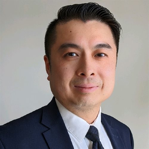 Headshot of John Lin, a wealth advisor at Chase