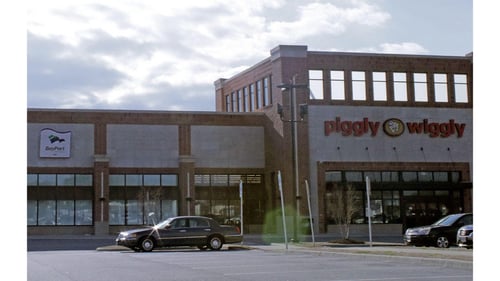 External view of local credit union and adjoining grocery store in Newport News, VA