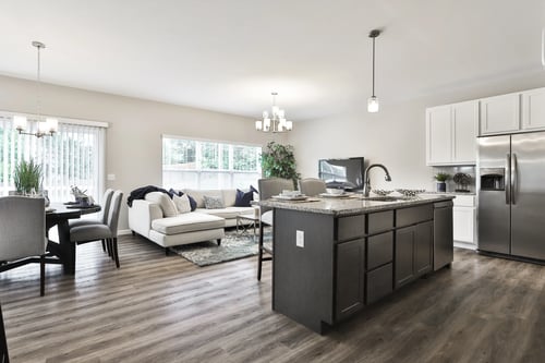 Kitchen and living room area at The Willows in O'Fallon, MO 63367