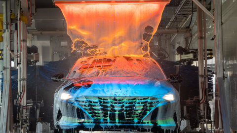 A car being immersed in a rich blanket of HotShine® Carnauba Wax