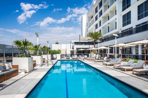Outdoor Pool, Poolside Seating, Enjoy Two Amenity Decks, and Poolside Cabanas