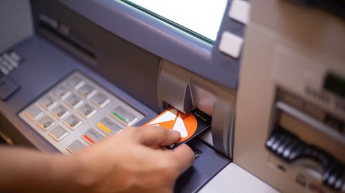 PNC debit card being inserted into an ATM