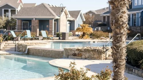 Resort-Style Swimming Pool with spacious sundeck.