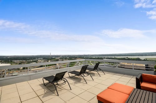 Lenox Club Rooftop deck with lounge chairs