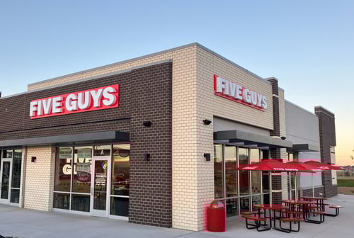 An exterior photograph of the Five Guys restaurant at 6160 Silverstone Drive in Frederick, Colorado.