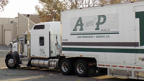 A and P Bekins truck in a parking lot