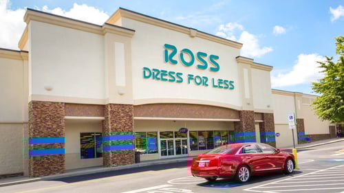 Red car passing by Ross Dress for Less entrance