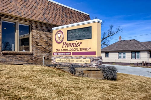 Photo of sign outside office building