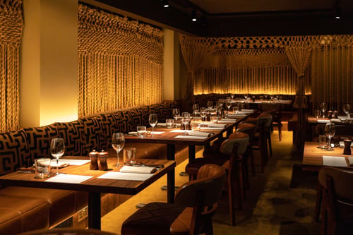 The downstairs dining area of The Meat & Wine Co