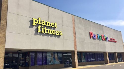 Front exteriors of Planet Fitness and Party City at Southfield Plaza - Southfield shopping center