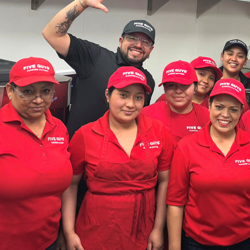 Crew members pose for a photograph ahead of the opening of the Five Guys cloud kitchen at 90 Charter Oak in San Francisco California.