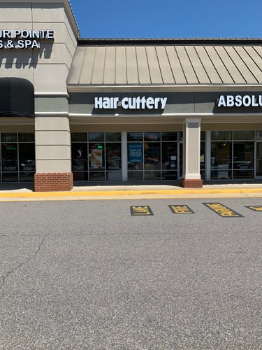 The front entrance of Hair Cuttery at Harbour Pointe Village.