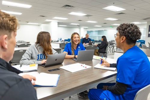 Joyce University nursing students in a group study session in Flo's study center on campus in SLC